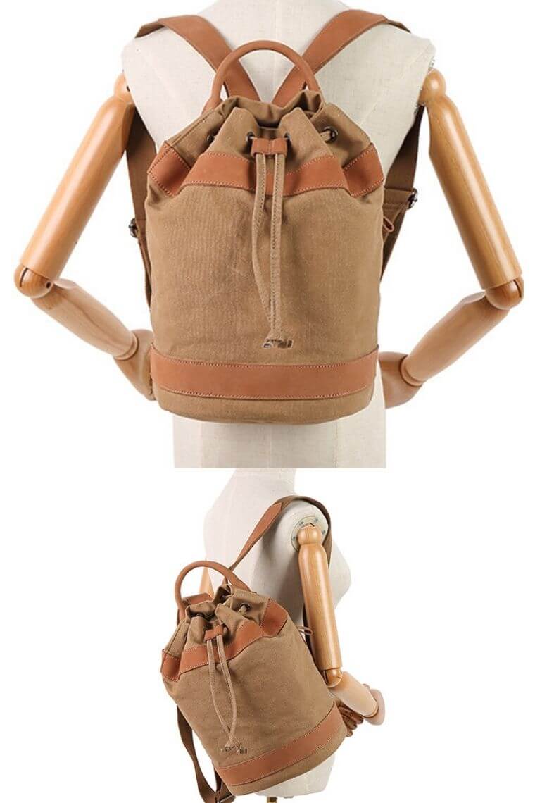 ladies travel backpack in cylinder shape | waterproof canvas backpack for women | drawstring backpack for girls | women day pack in canvas with leather trim | carry on backpack with drawstring closure | dry day backpack