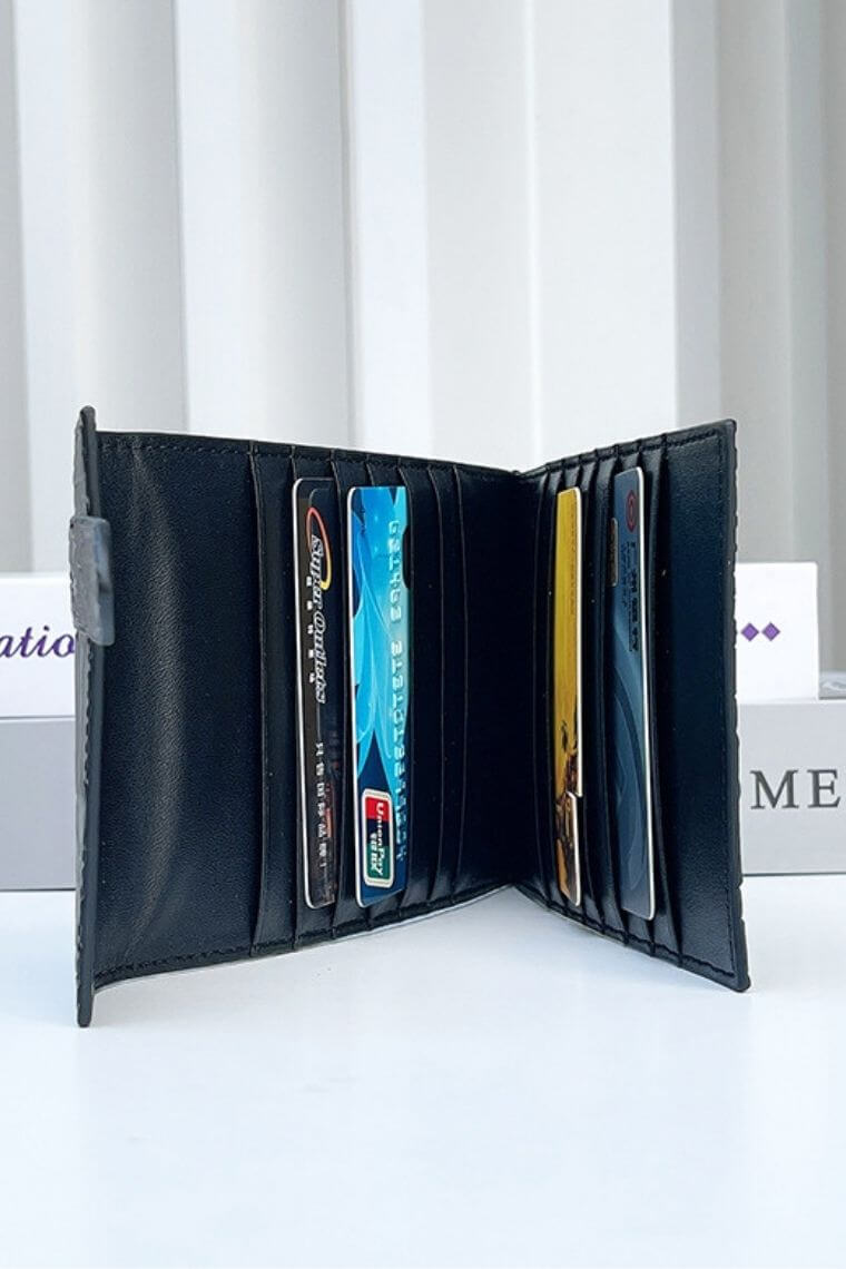 Snake embossed leather card holder