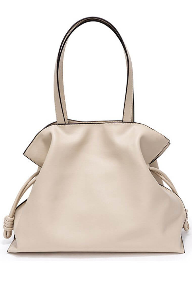 Women designer tote bag with drawstring in soft cream leather to hold 13 inch laptop for work or travel