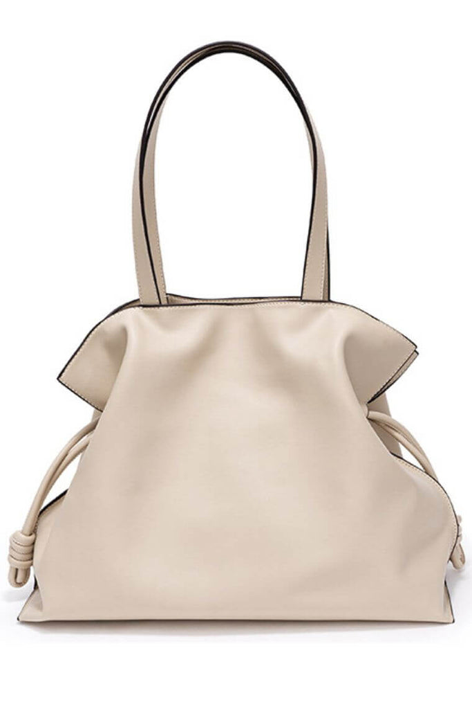 Women designer tote bag with drawstring in soft cream leather to hold 13 inch laptop for work or travel