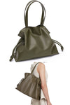 Women designer tote bag with drawstring in soft green leather to hold 13 inch laptop for work or travel