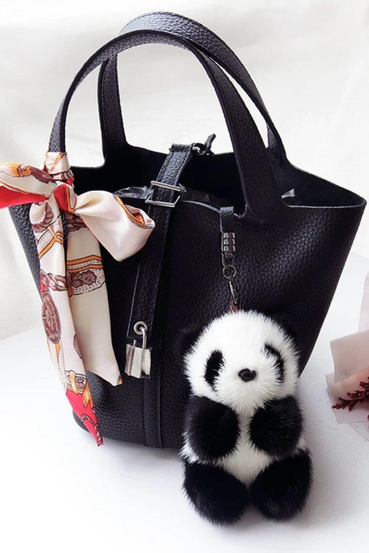 designer panda pompom keychain in soft and fluffy mink fur with O ring can also be used as a bag charm or luxury plush toy for teenagers
