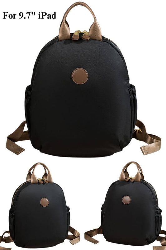 women cute small backpack purse in oval shape in water resistant black fabric with top handle for travel or everyday use