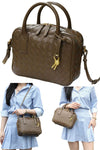women designer small dark sand tote bag in hand woven leather with crossbody strap and zipper closure in square shape