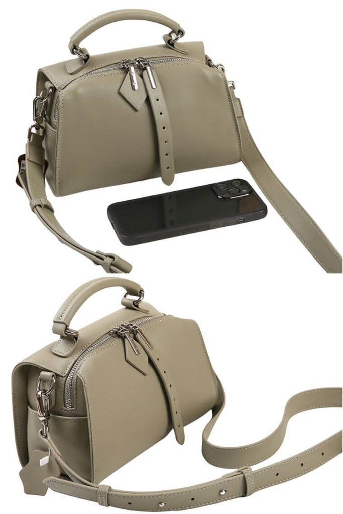 women dark green leather small boston bag with top carry handle and cross body strap zipper closure