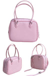 women mini retro tote bag in pink leather with crossbody long strap and zipper closure in square shape