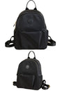 women small black backpack purse in water resistant fabric with multi pockets for travel or everyday use