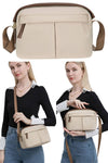 women small crossbody sling bag in waterproof beige nylon with multi pocket for travel or everyday use big enough to hold iPad Mini