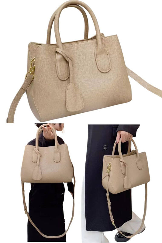 women small crossbody tote bag in beige leather with hanging charm for work or everyday use 