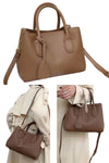 women small crossbody tote bag in dark brown leather with hanging charm for work or everyday use