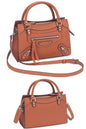 women stylish brown pebbled leather small satchel city bag with a hands-free crossbody strap and  top handles and multiple zip pockets for everyday use and fits for casual or formal occasions
