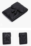 black card holder with flap | card holder wallet in quilted leather | business card holder with press stud
