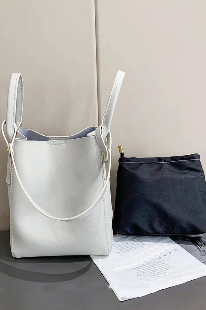 White bucket bag | leather bucket bag with magnet closure | bucket purse with convertible straps | crossbody bucket bag with small purse | designer bucket bag in leather | white bucket bag purse | shoulder bucket bag in leather